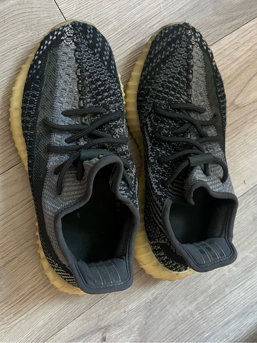 Yeezy Boost Knit Athletic Sneakers in Black and Gray with Gum Sole